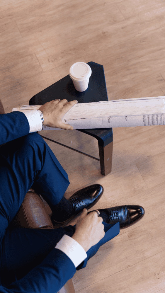 Work & Social Insider Series Jon Barnett Holding Blueprints