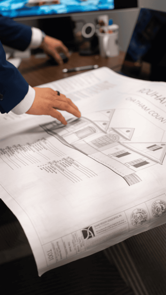 Work & Social Insider Series Jon Barnett and Social Work&Social Private Office for Rent in Car Space Raleigh Showing Karma Construction Blueprints